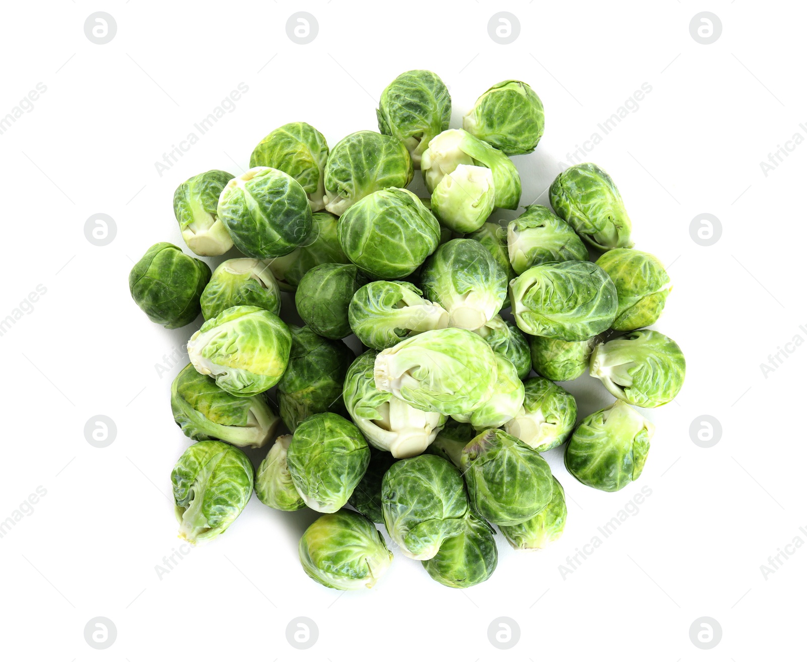 Photo of Pile of fresh Brussels sprouts isolated on white, top view