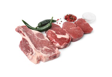 Cut fresh beef meat with spices isolated on white