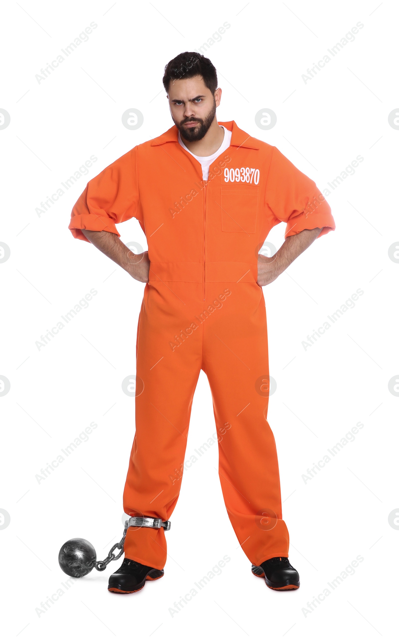 Photo of Prisoner in jumpsuit with metal ball on white background