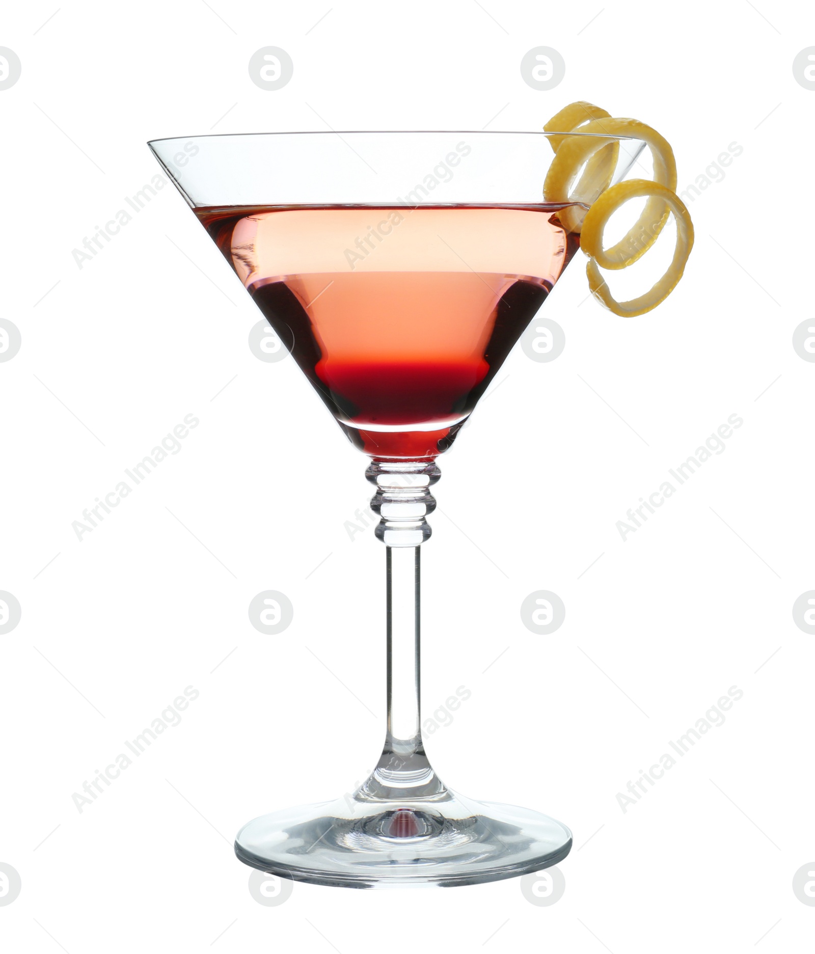 Photo of Glass of martini cocktail with lemon zest on white background