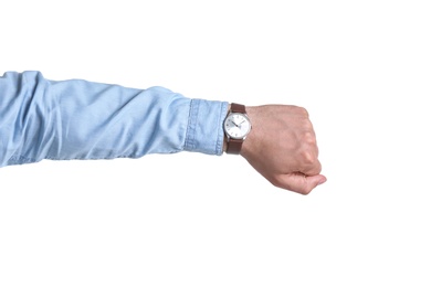 Young man with wristwatch on white background. Time concept