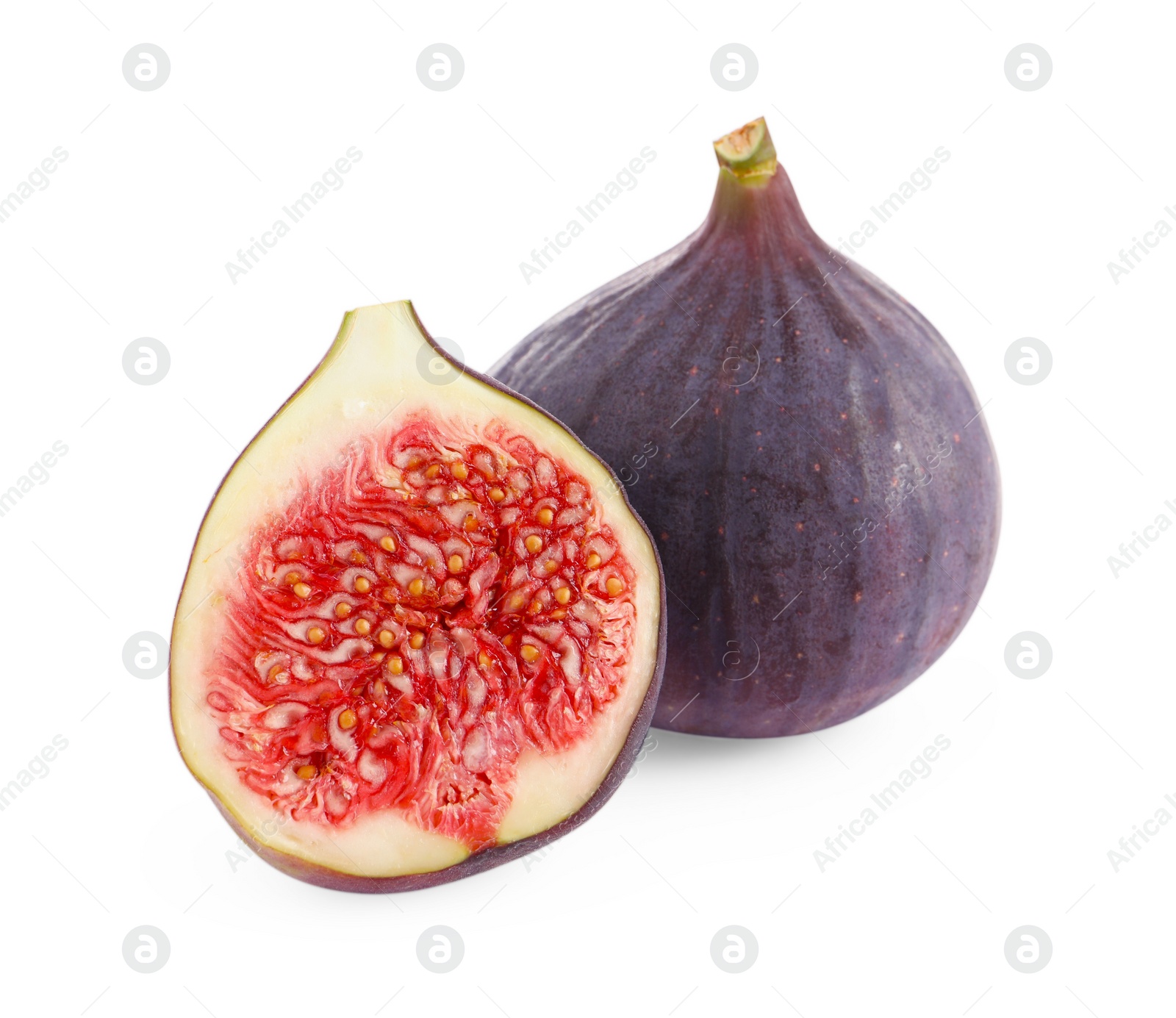 Photo of Whole and cut ripe figs isolated on white