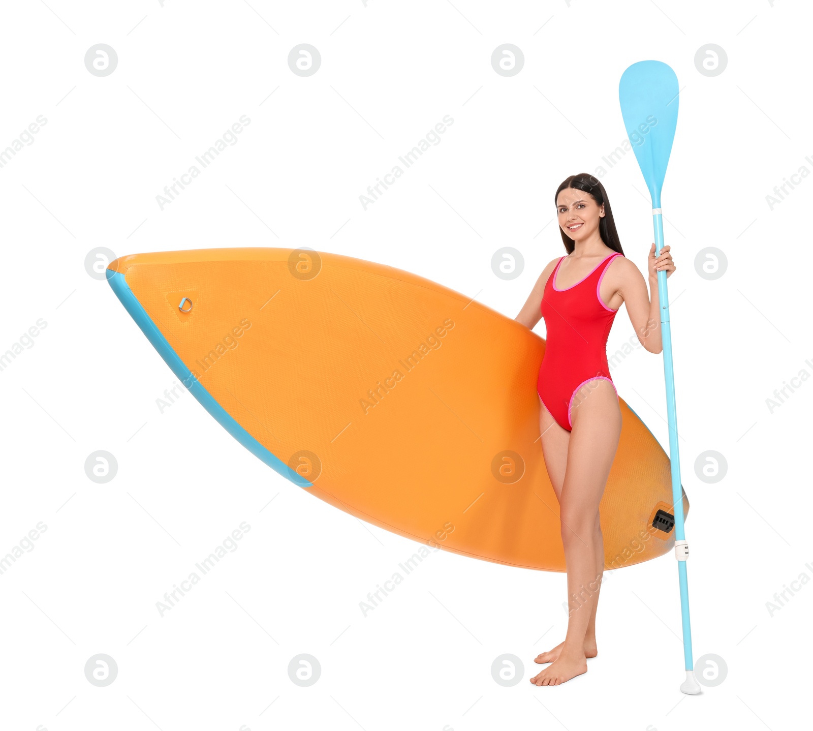 Photo of Happy woman with orange SUP board and paddle on white background