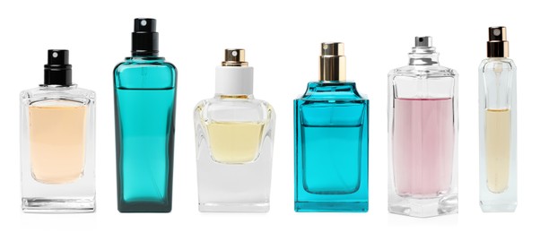 Image of Set with different bottles of perfume on white background. Banner design