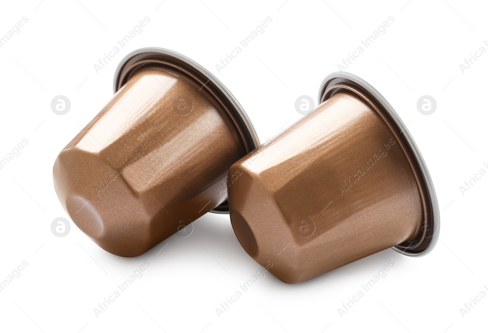 Photo of Two plastic coffee capsules isolated on white