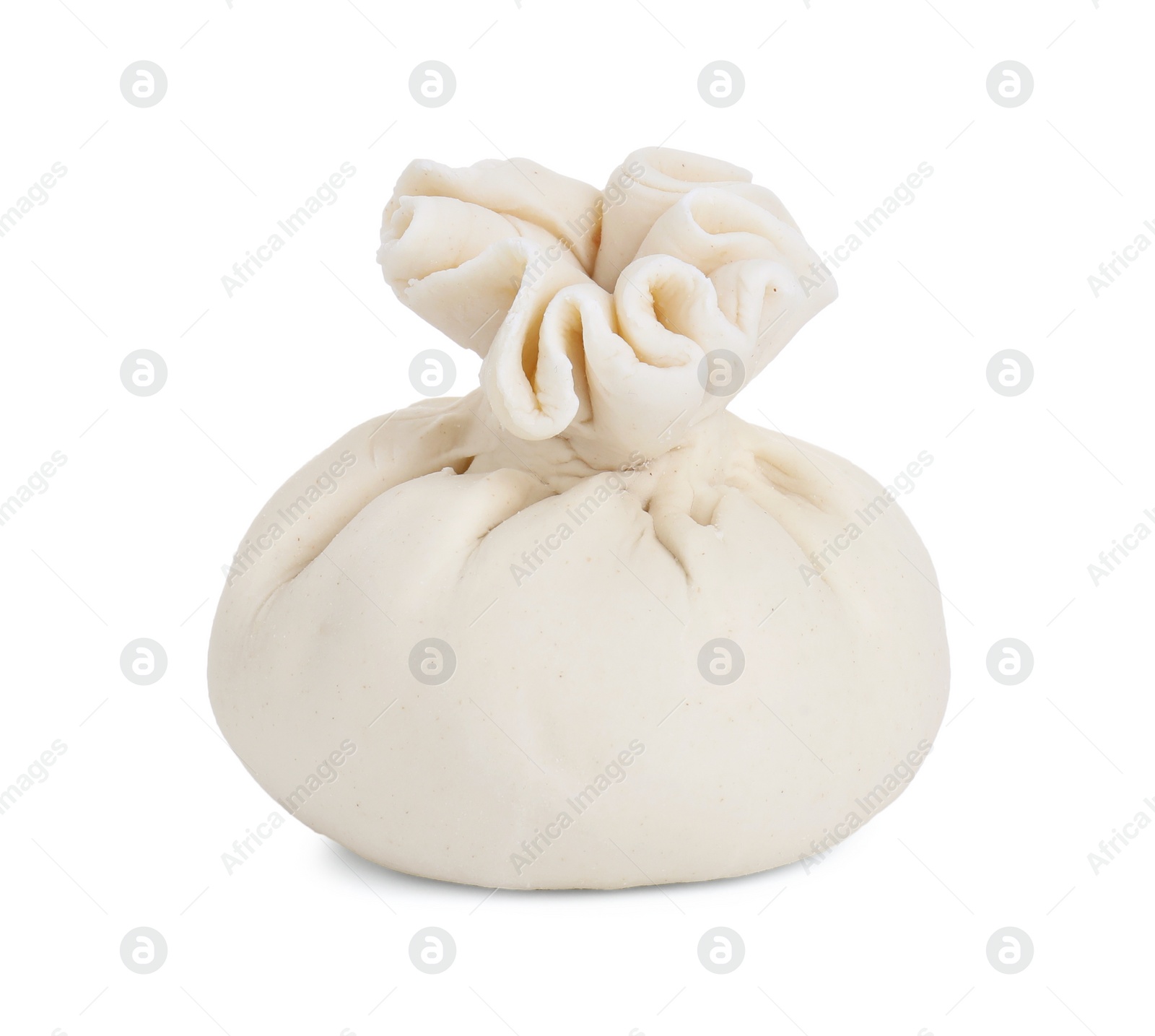 Photo of Uncooked khinkali (dumpling) isolated on white. Georgian cuisine