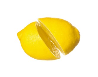 Fresh ripe cut lemon on white background