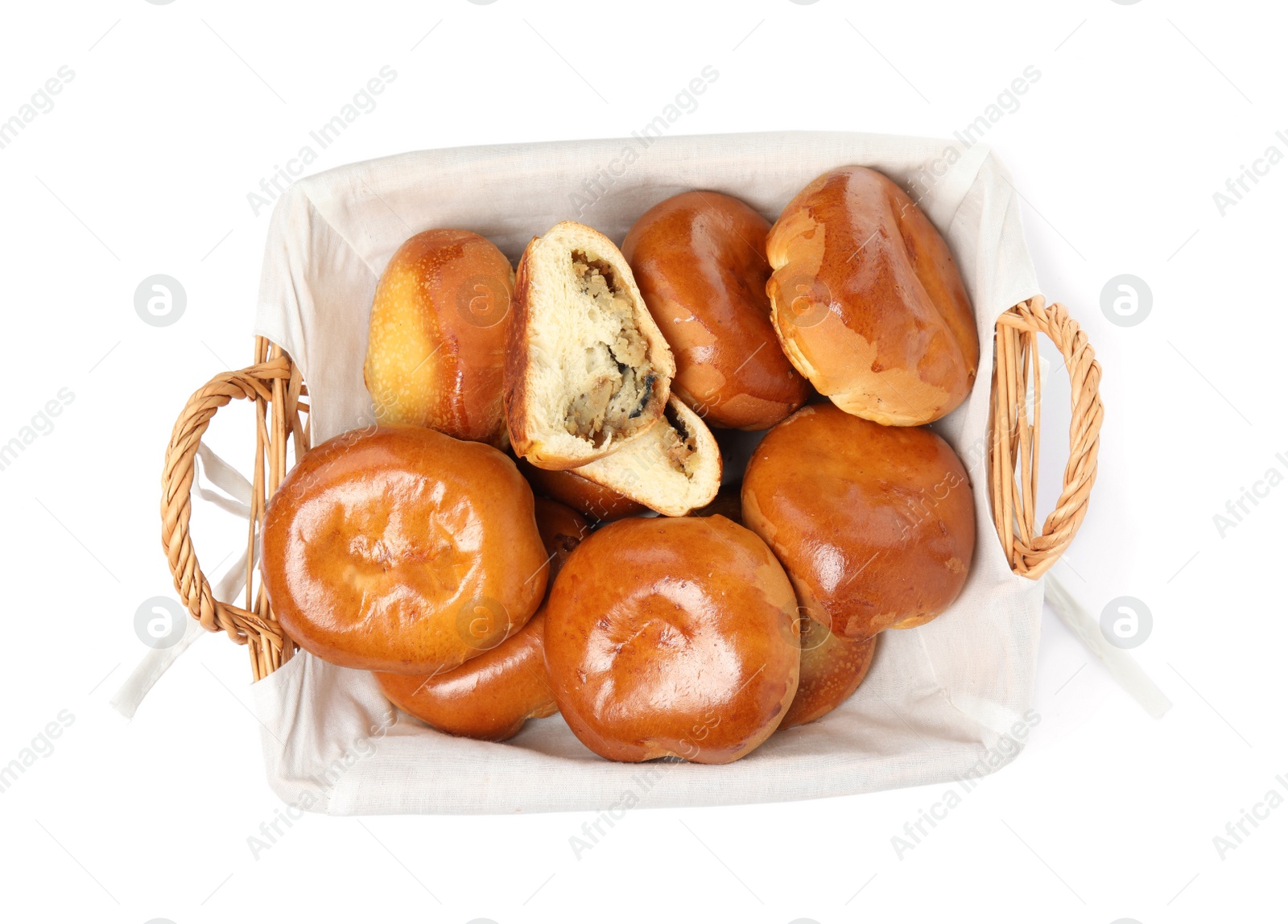 Photo of Delicious baked mushrooms and onion pirozhki on white background, top view