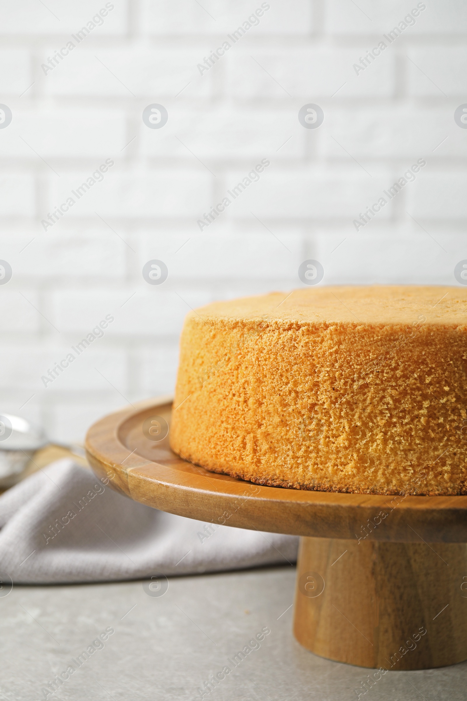 Photo of Delicious fresh homemade cake on light grey marble table