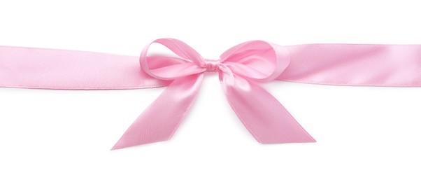 Photo of Pink satin ribbon with bow on white background, top view
