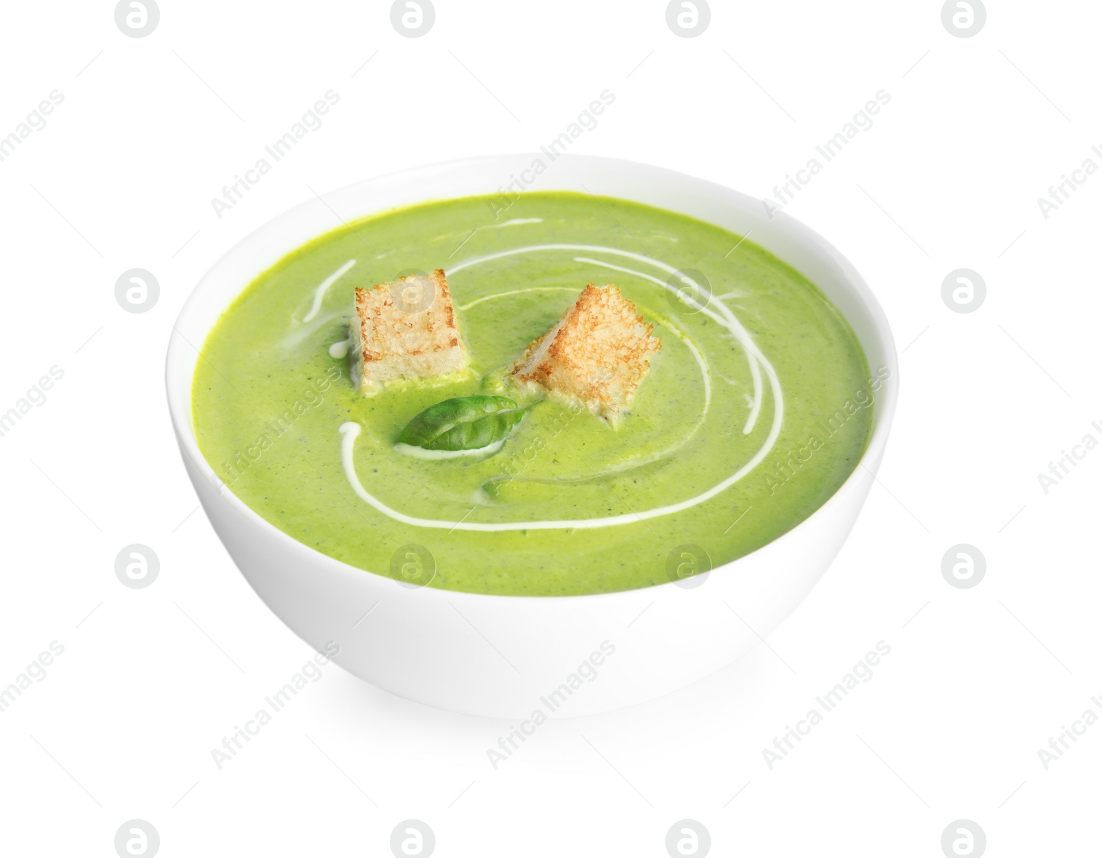 Photo of Delicious broccoli cream soup with croutons isolated on white