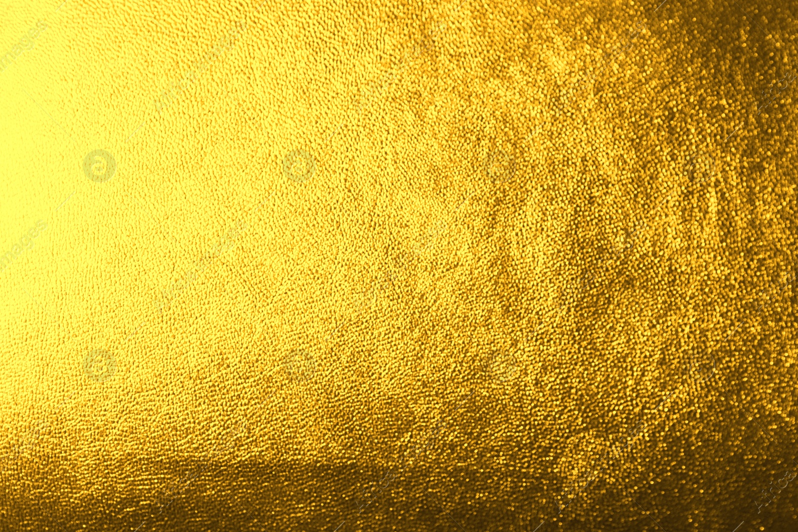 Image of Golden textured surface as background, closeup view