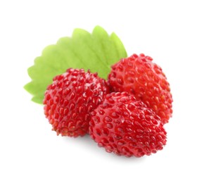 Photo of Ripe wild strawberries and green leaf on white background