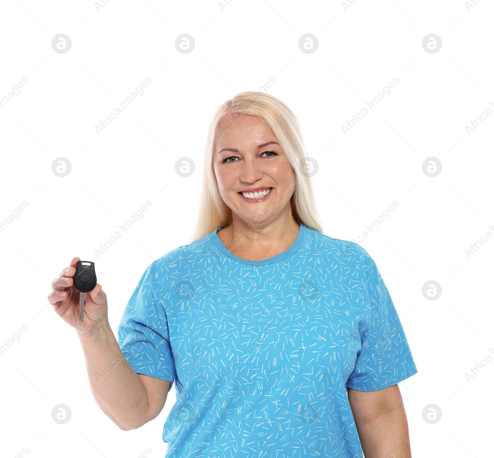 Photo of Happy mature woman with car key on white background. Getting driving license