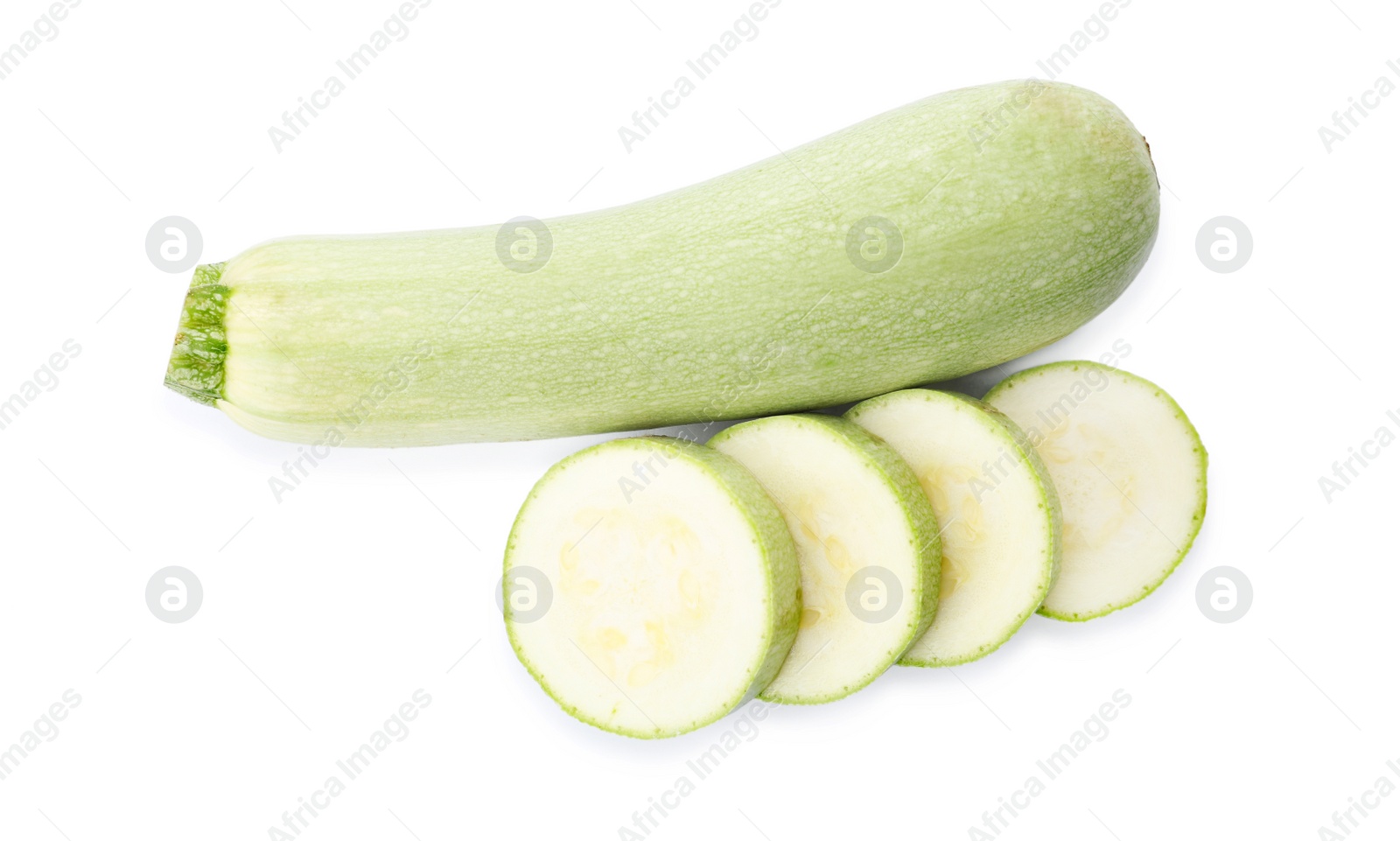 Photo of Cut and whole green ripe zucchinis on white background, top view