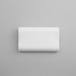 Photo of Clean soft orthopedic pillow on grey background, top view