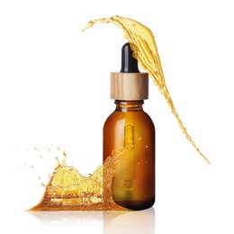 Image of Bottle of cosmetic product with essential oil and splashes around on white background