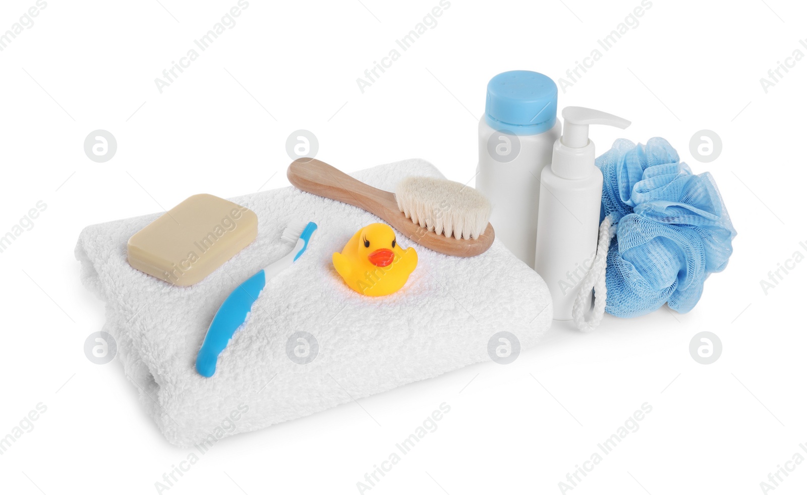 Photo of Baby cosmetic products, bath duck, toothbrush and towel isolated on white