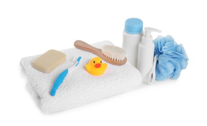 Baby cosmetic products, bath duck, toothbrush and towel isolated on white