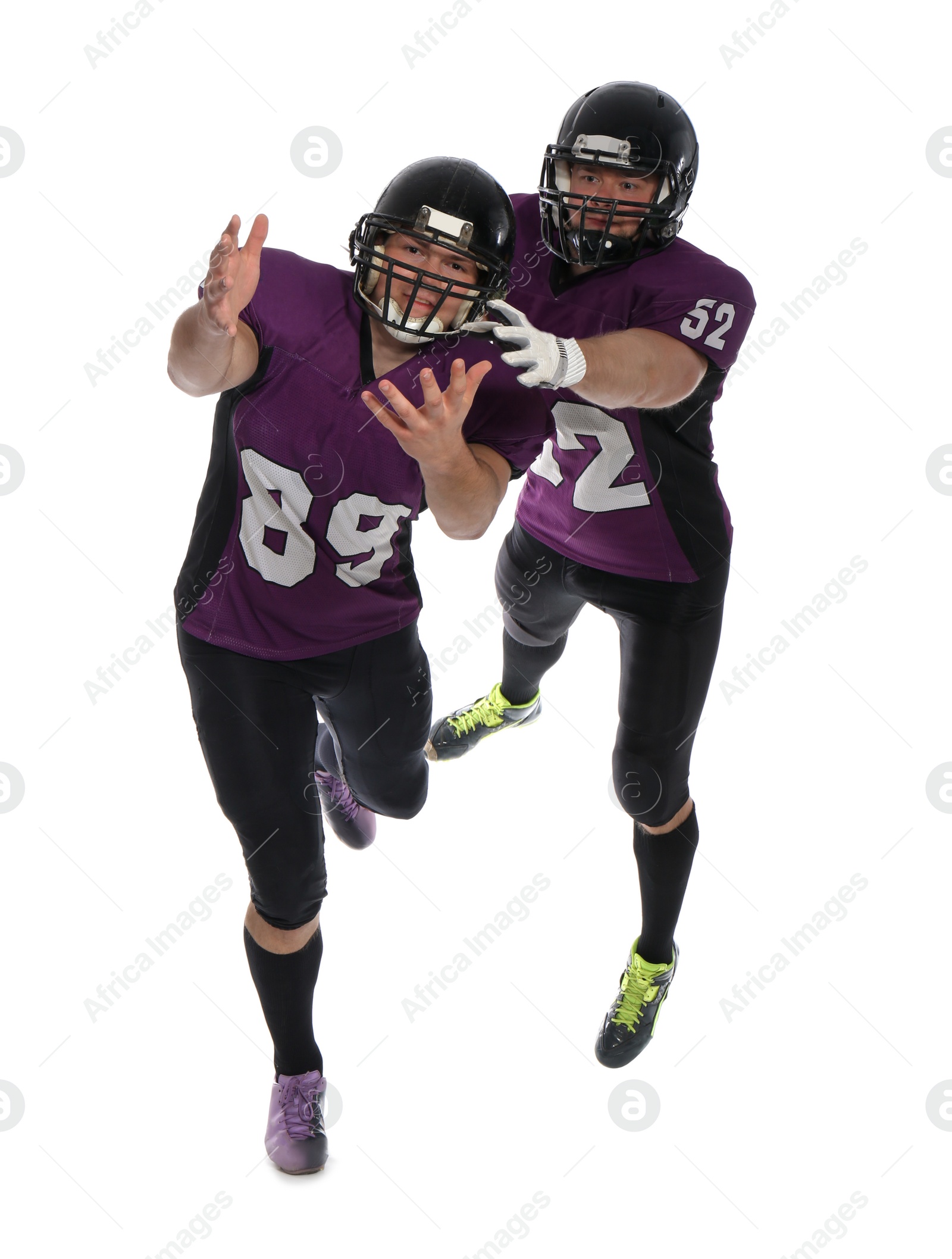 Photo of Men in uniform playing American football on white background