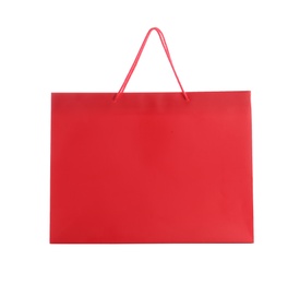 Photo of Red paper shopping bag isolated on white