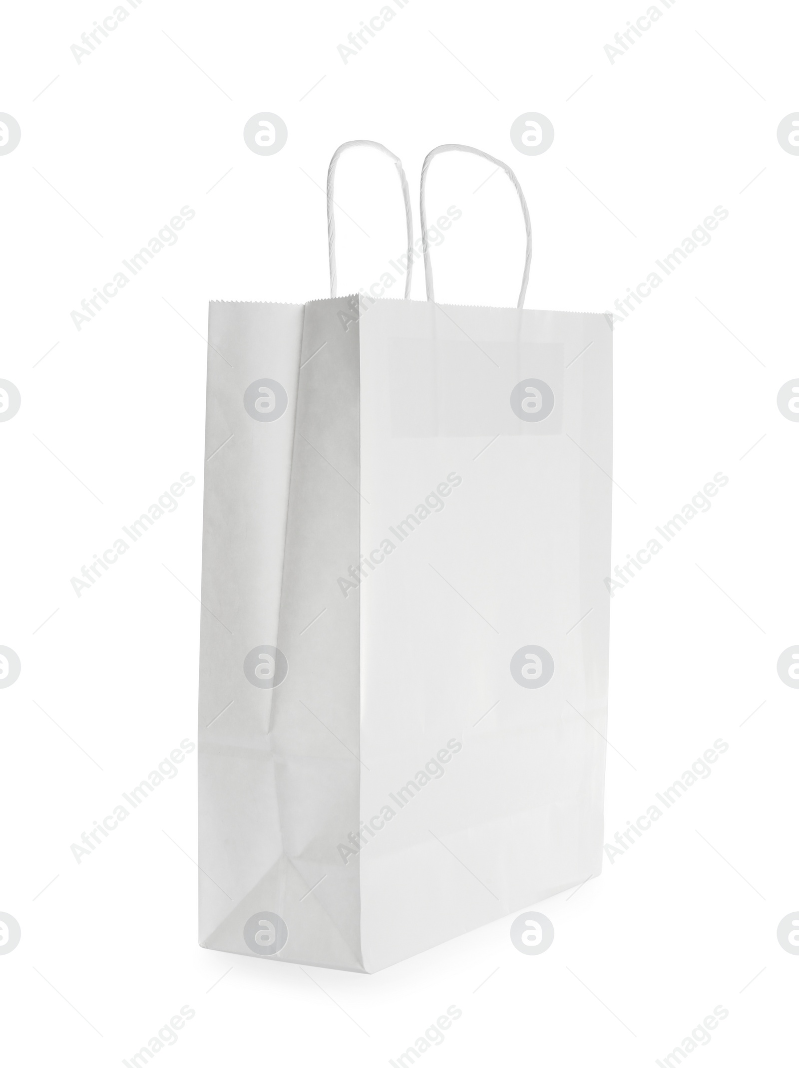 Photo of Blank paper bag isolated on white. Mockup for design