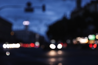 Blurred view of modern city at evening. Bokeh effect