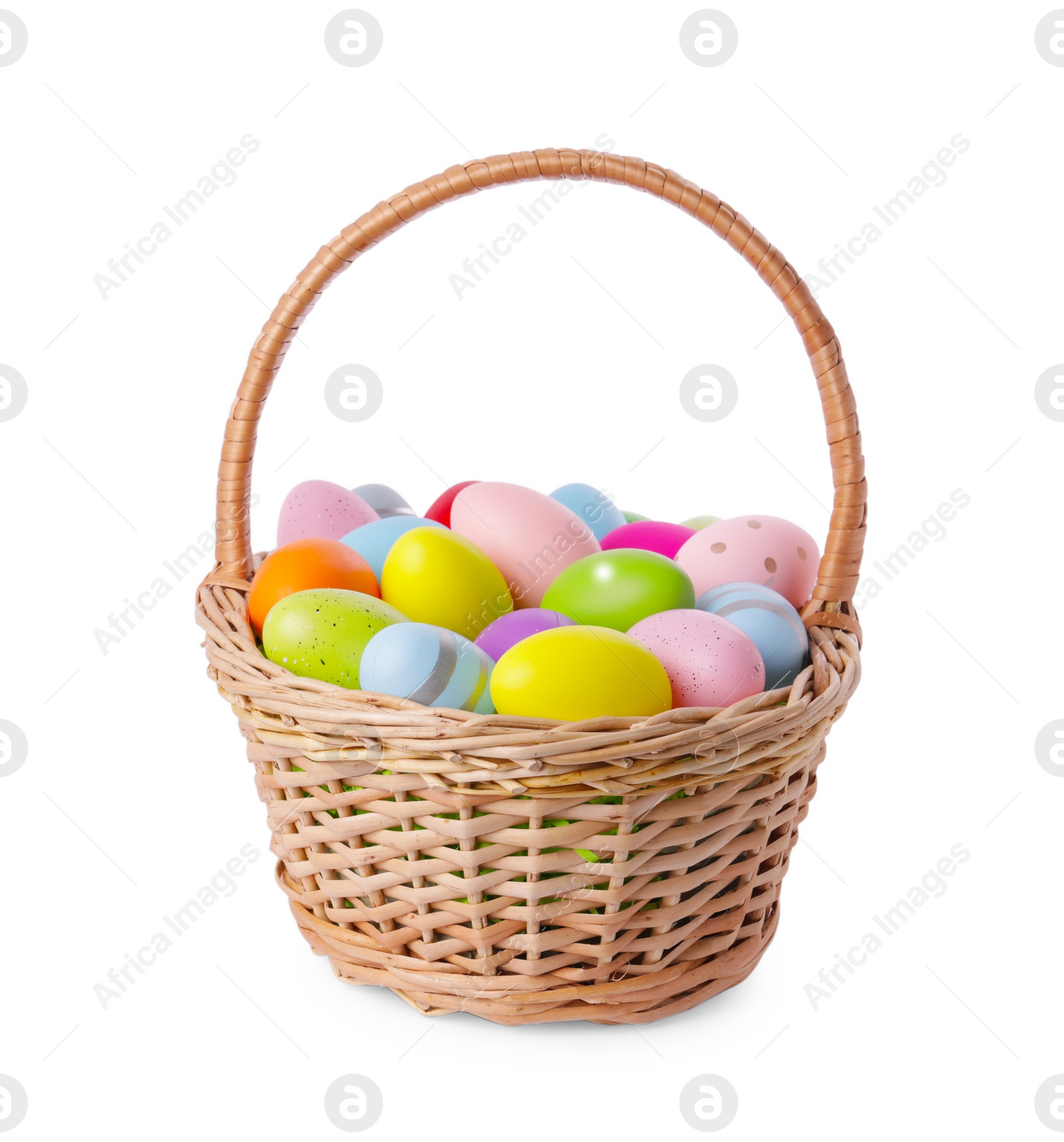 Photo of Wicker basket with beautifully painted Easter eggs isolated on white