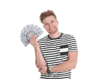 Happy young man with money on white background