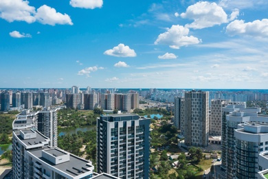 Image of Aerial view of modern buildings in city center