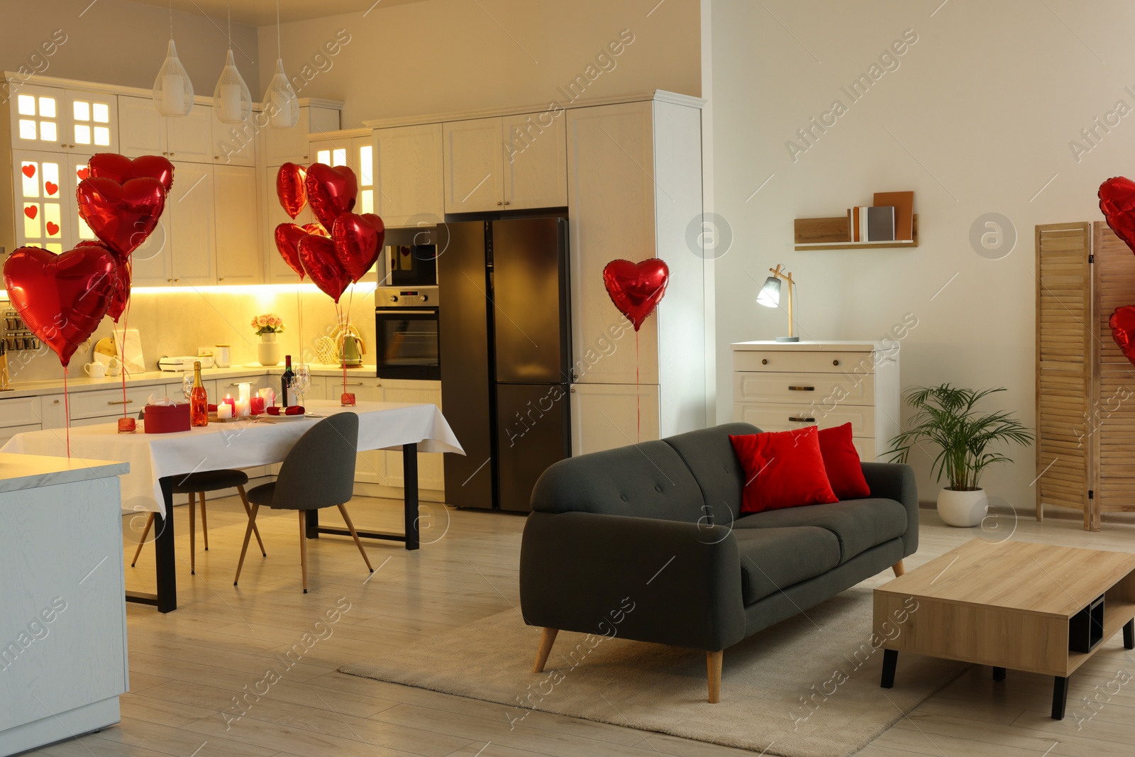 Photo of Romantic atmosphere. Cosy room decorated for Valentine day