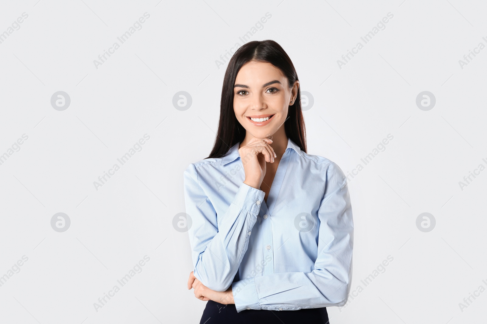 Photo of Portrait of young businesswoman on white background