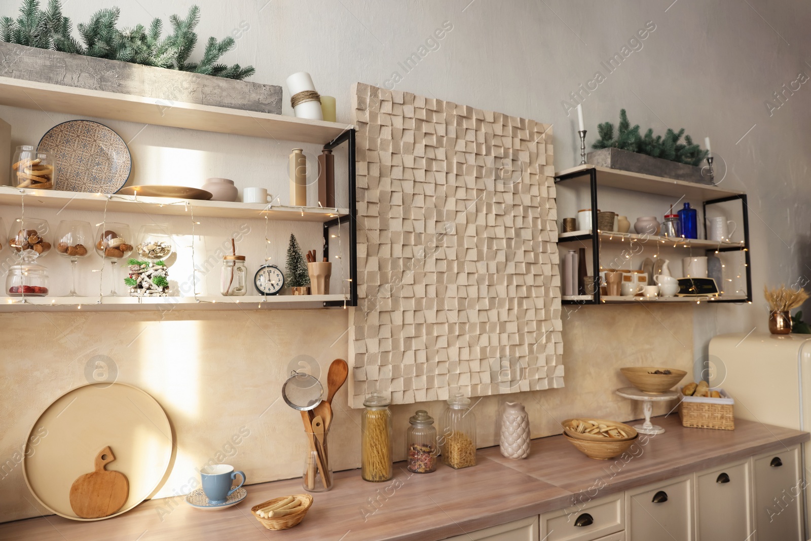 Photo of Kitchen interior with festive decor. Christmas celebration