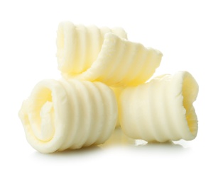 Photo of Tasty butter curls on white background