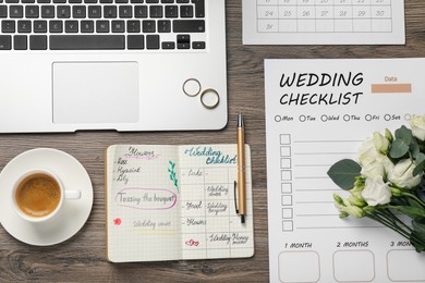 Photo of Flat lay composition with Wedding planner and checklist on wooden table