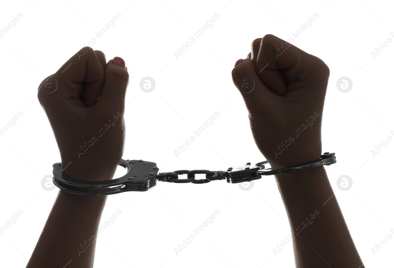 Photo of Freedom concept. Woman with handcuffs on white background, closeup