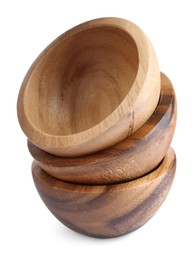 Photo of Set of wooden bowls on white background