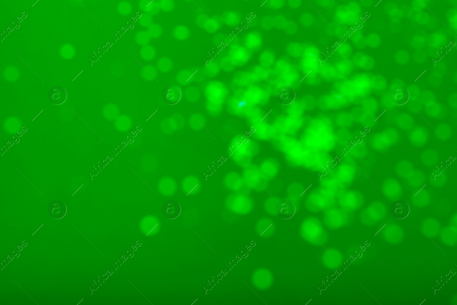 Image of St. Patrick day. Green background with blurred lights, bokeh effect