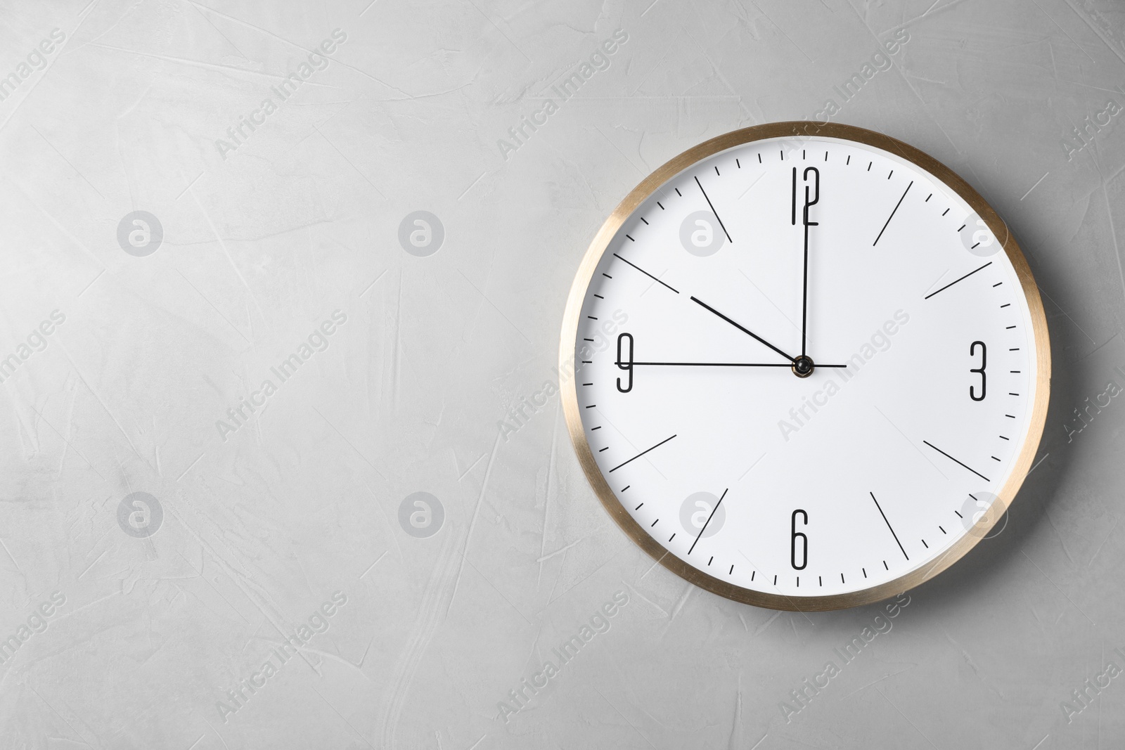 Photo of Modern clock on grey background, top view. Time management