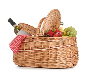 Photo of Picnic basket with wine and fruits isolated on white