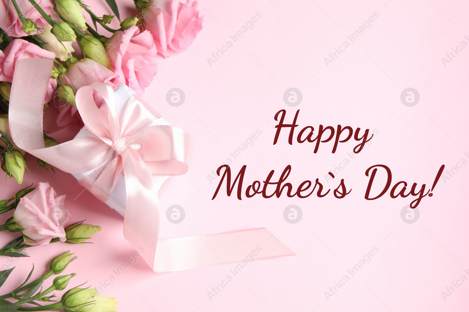 Image of Happy Mother's Day greeting card. Beautiful flowers and gift box on pink background