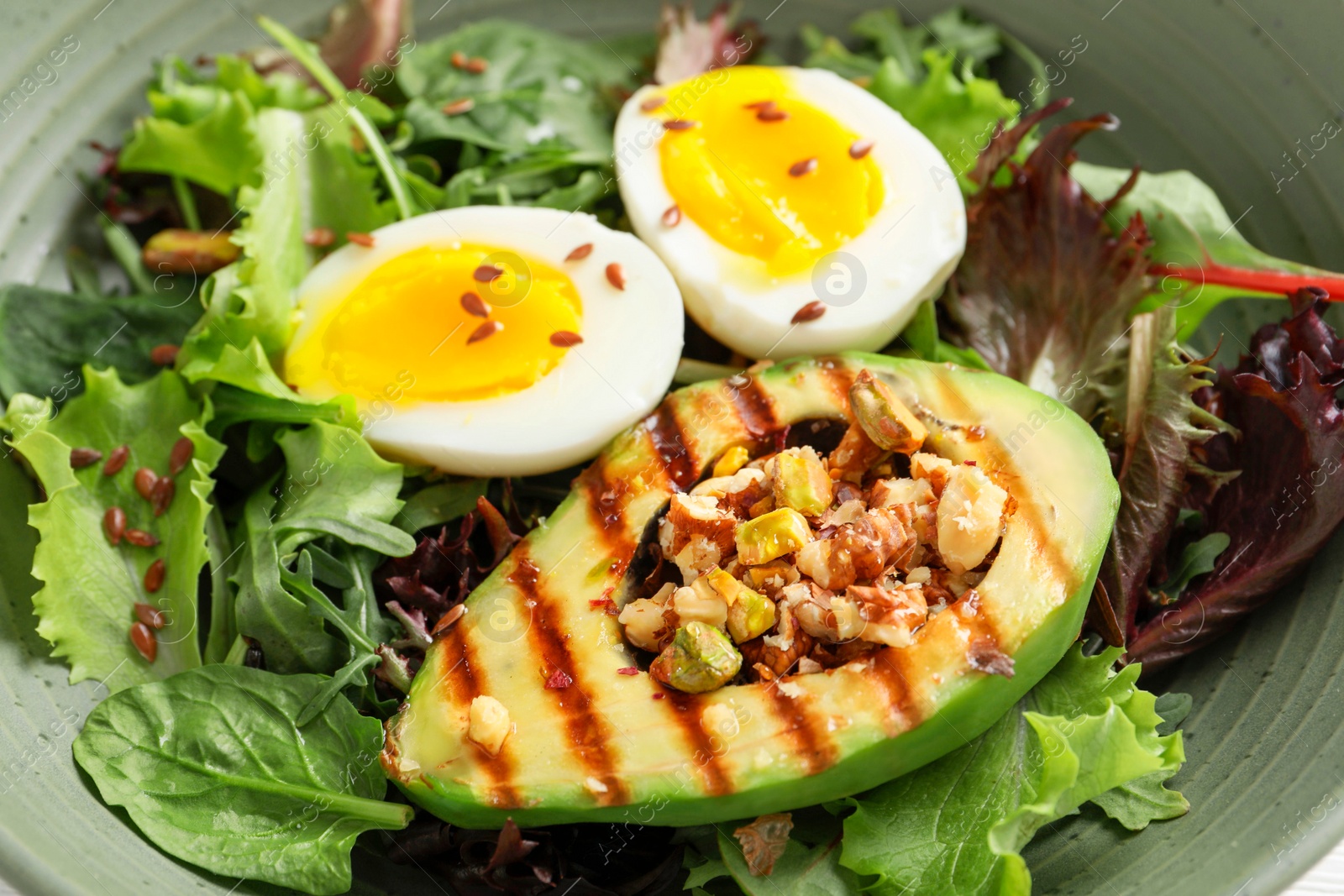 Photo of Healthy dish high in vegetable fats in bowl, closeup