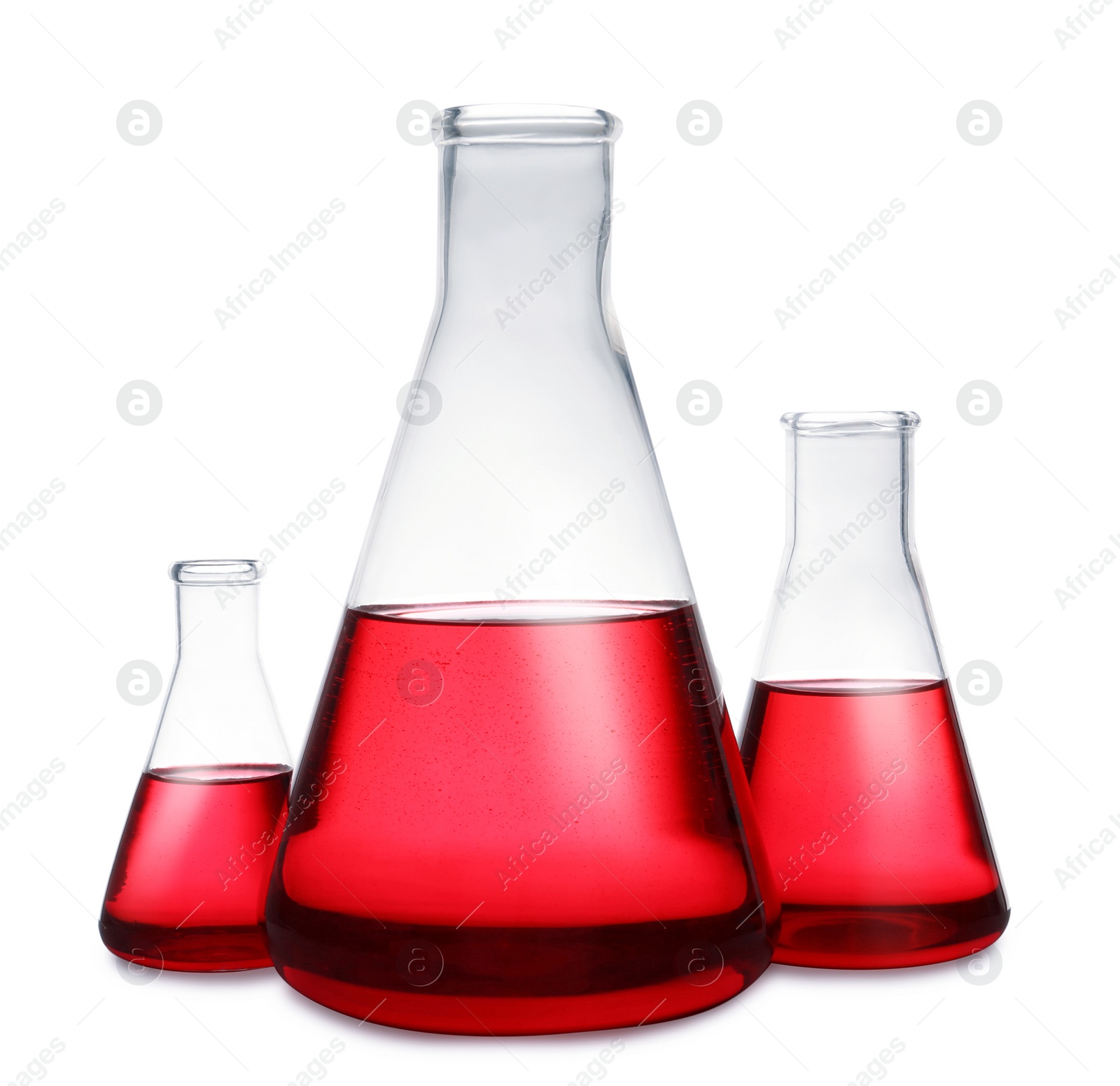 Photo of Conical flasks with red liquid on white background. Laboratory glassware