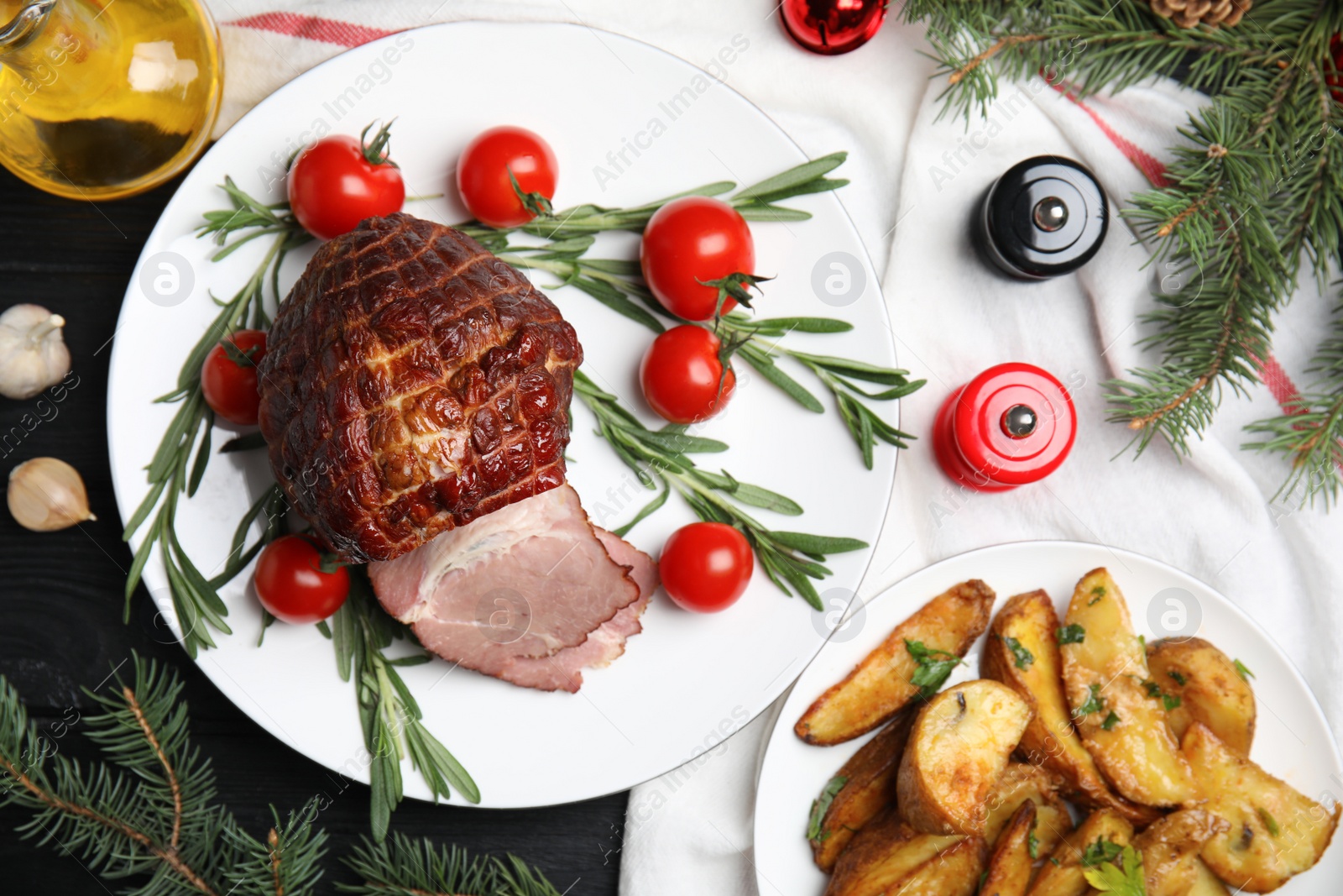 Photo of Flat lay composition with delicious ham on black wooden table