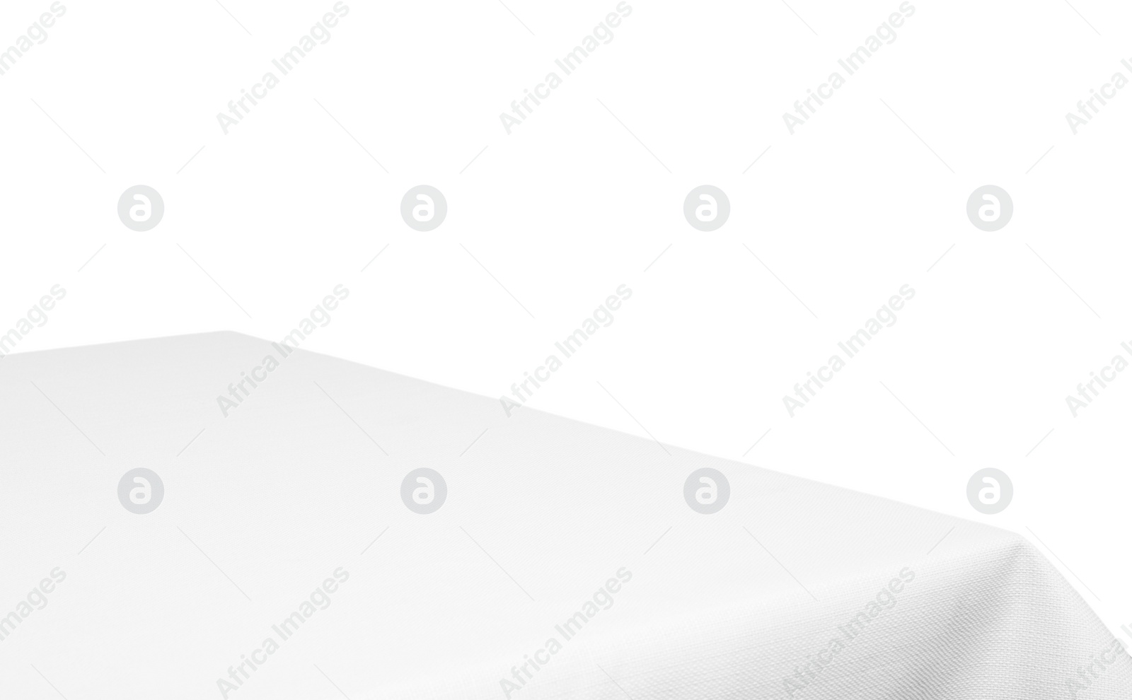 Photo of Empty table with tablecloth isolated on white