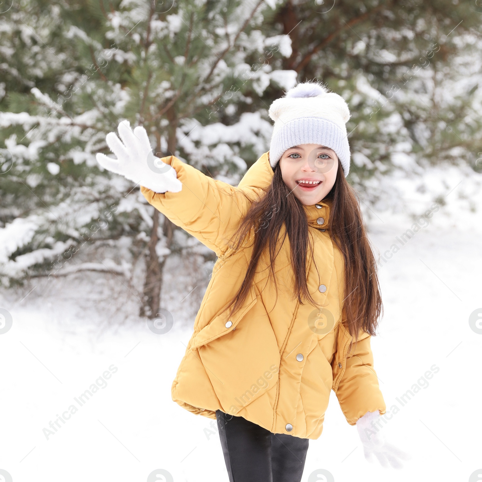 Photo of Cute little girl outdoors on winter day. Christmas vacation