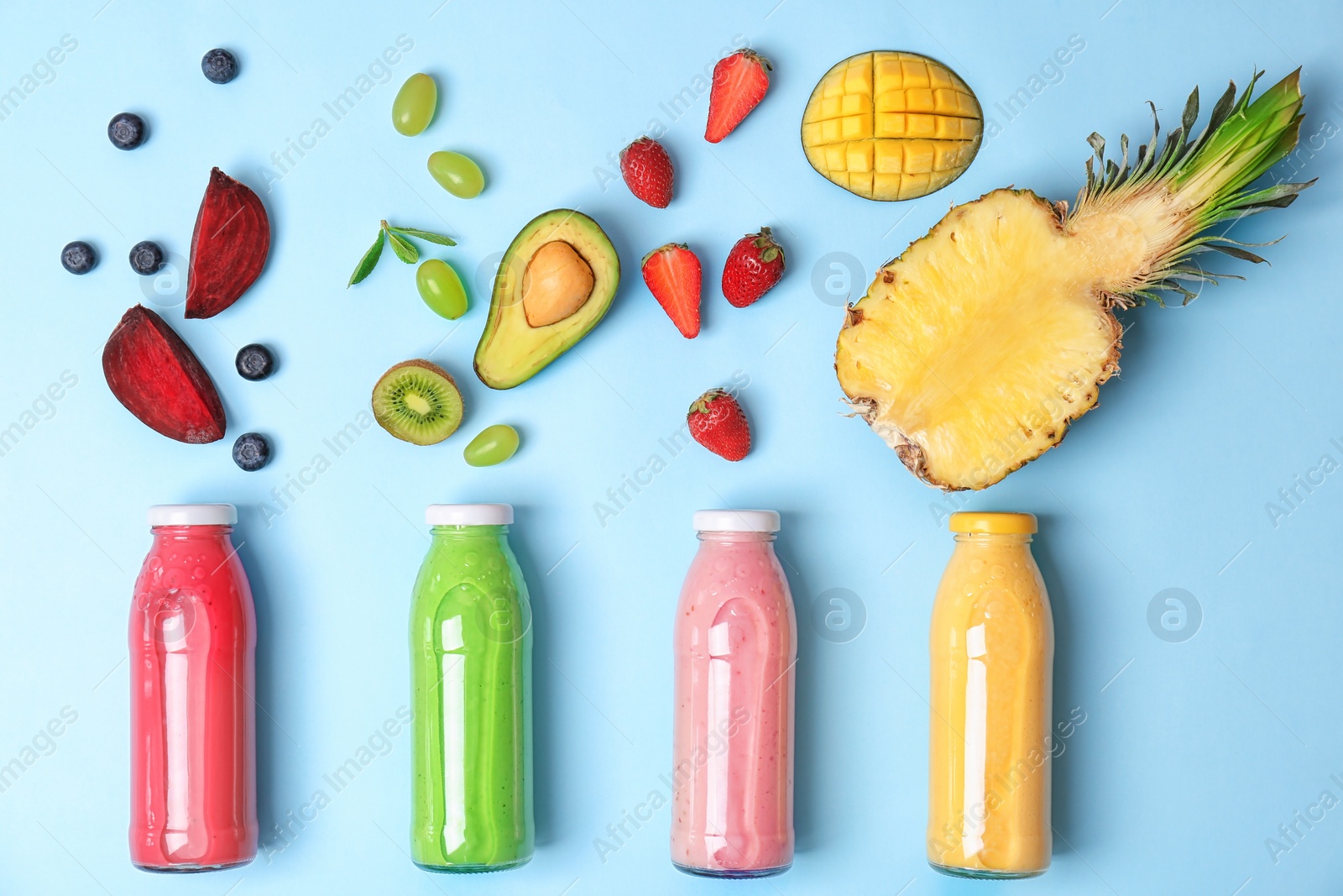 Photo of Flat lay composition with healthy detox smoothies and ingredients on color background