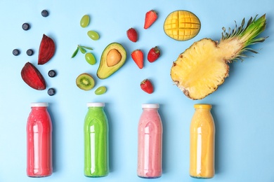 Photo of Flat lay composition with healthy detox smoothies and ingredients on color background