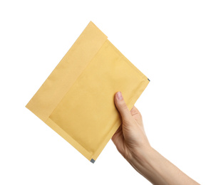 Woman holding kraft paper envelope on white background, closeup
