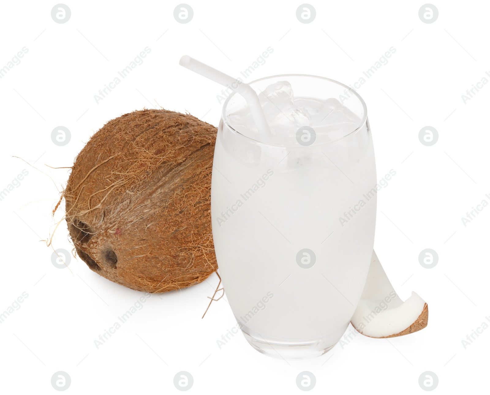 Photo of Glass of coconut water, ice cubes and nuts isolated on white